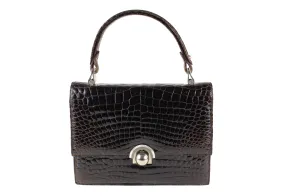 Brown crocodile skin handbag with flap and decorative clasp