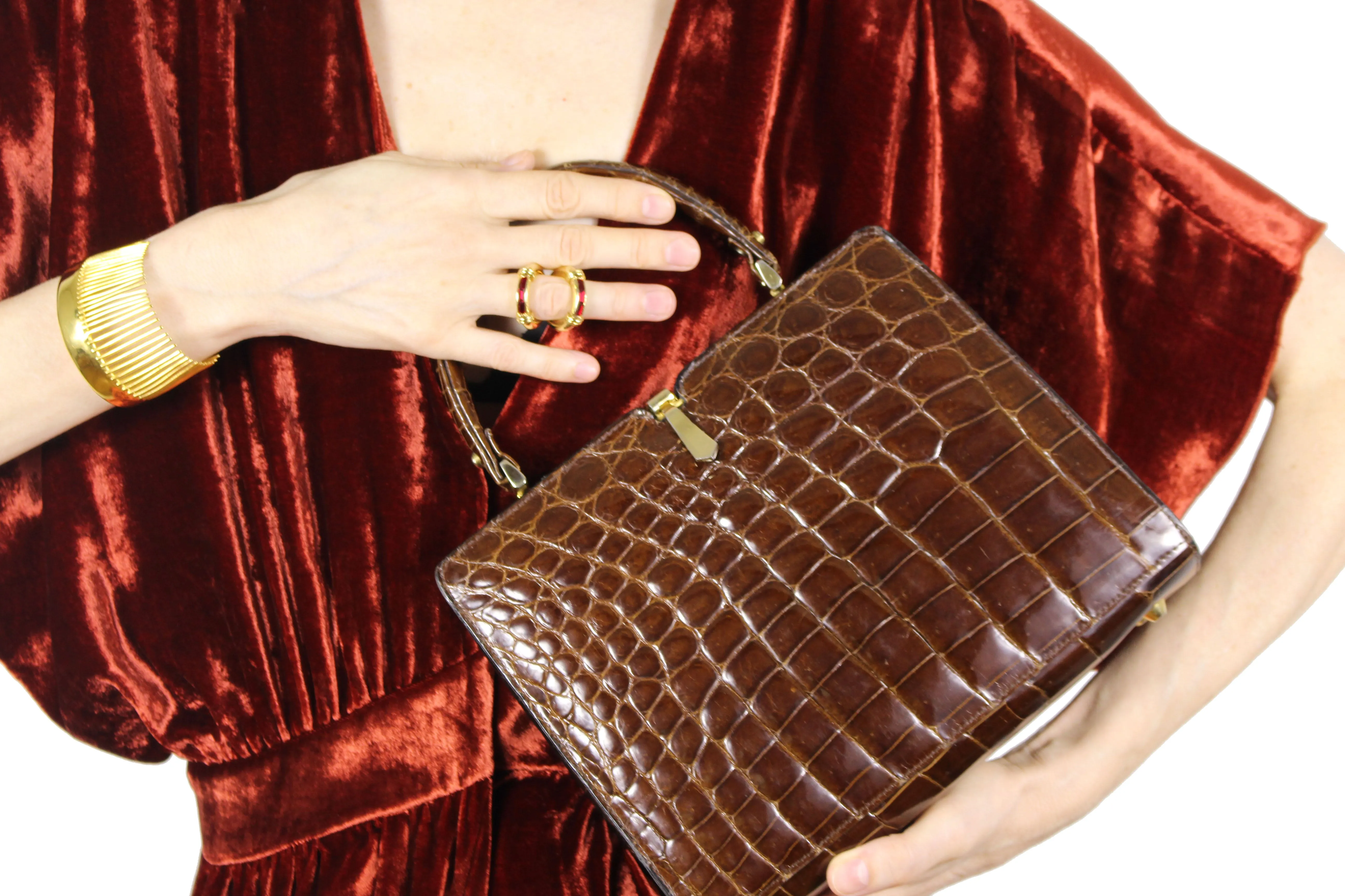 Glossy brown crocodile skin frame handbag