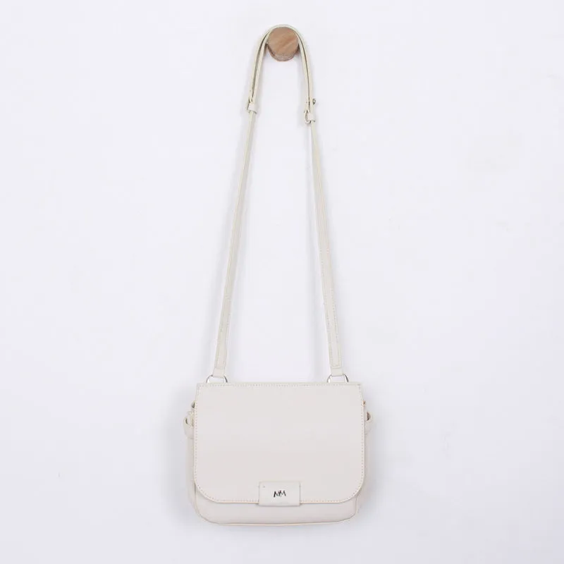 lisa ivory cross shoulder bag