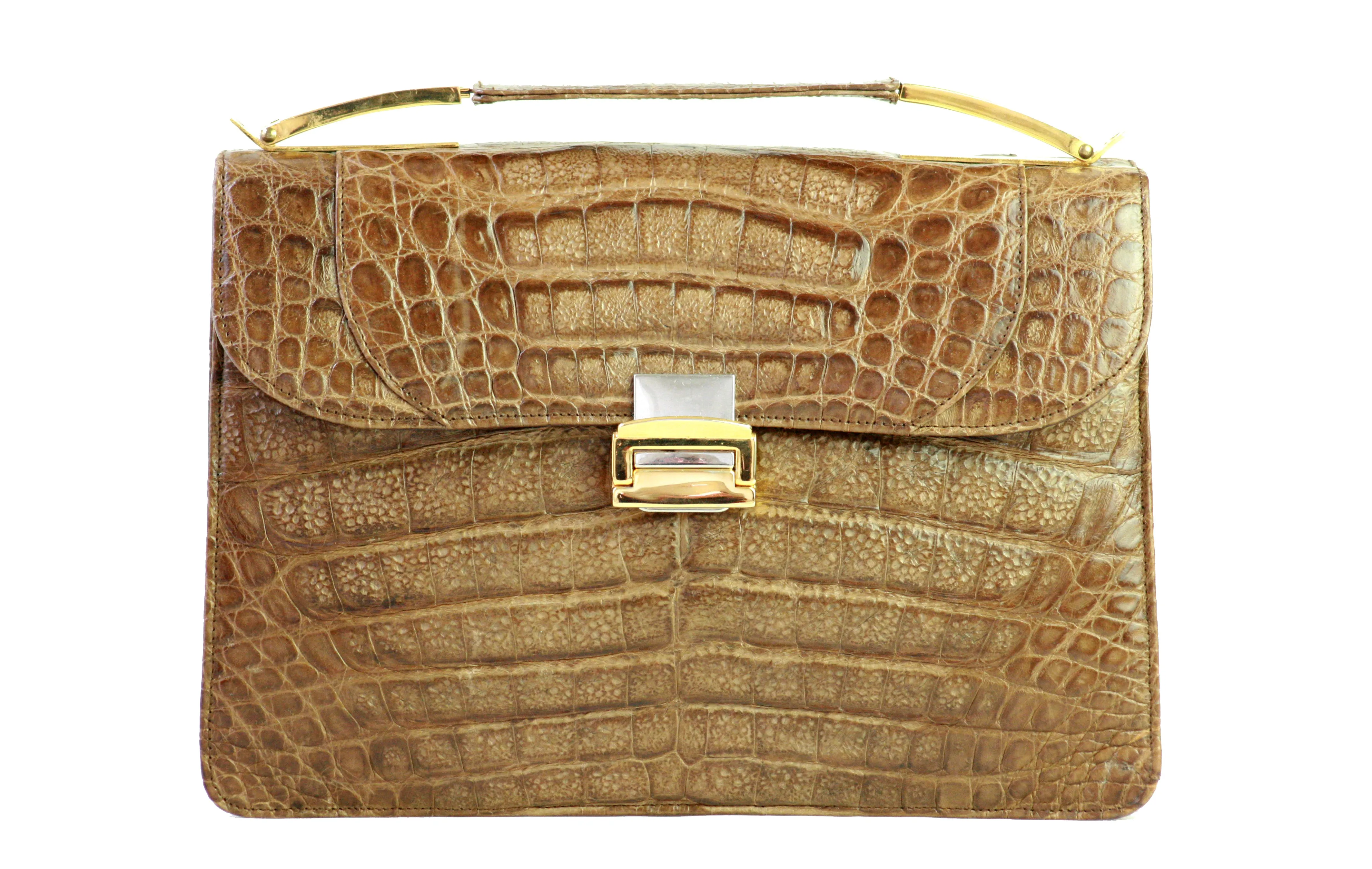 Tobacco brown crocodile skin handbag