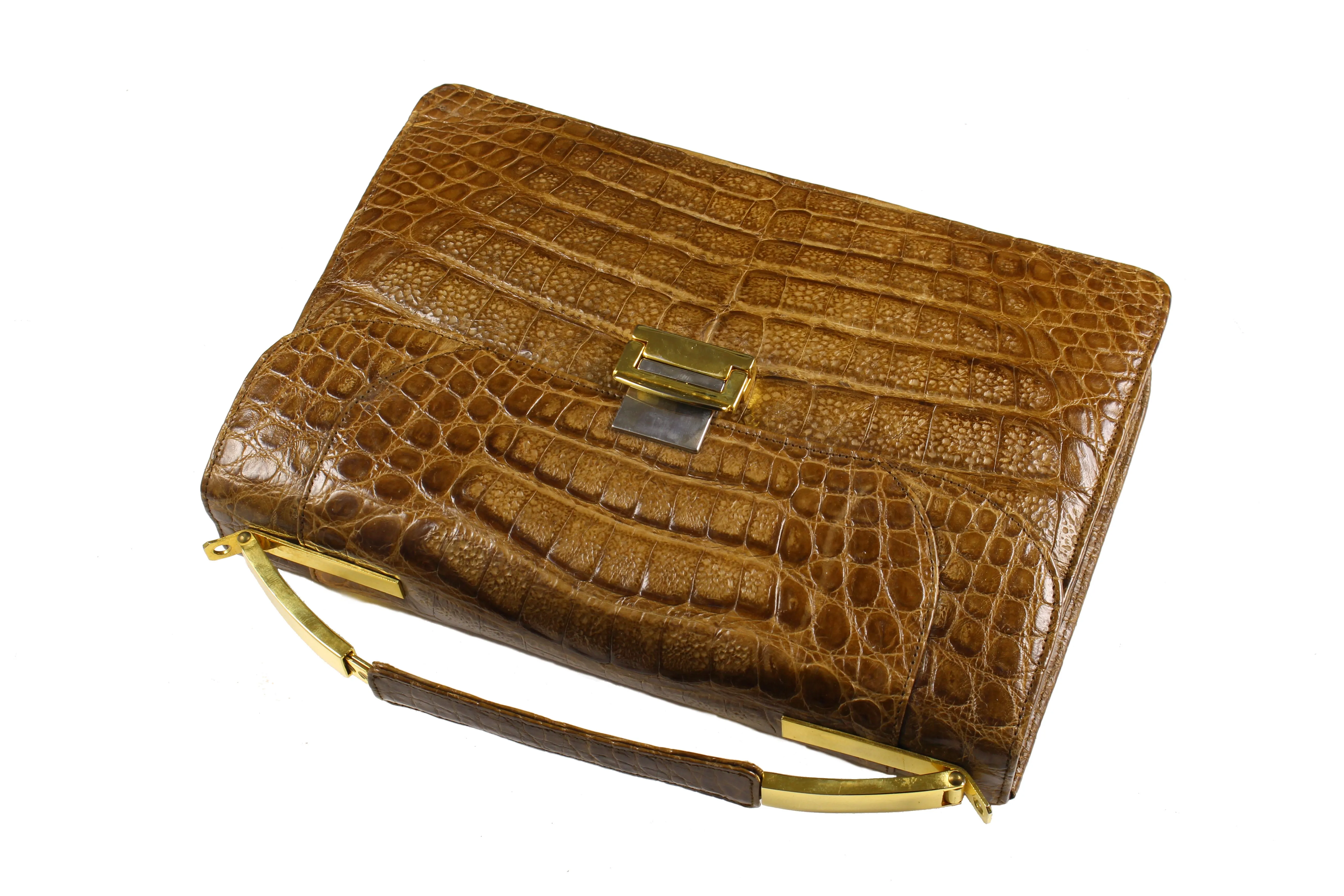 Tobacco brown crocodile skin handbag